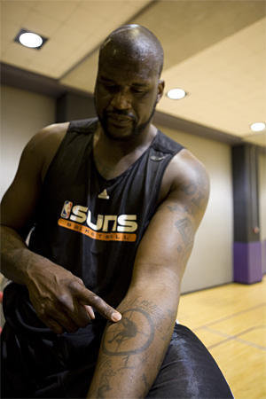 Shaq chose Diesel among his many pseudonyms as tattoo for his left 